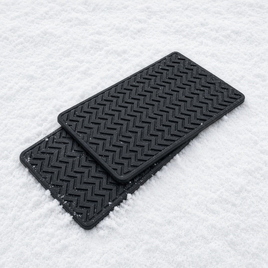 Pair of black traction mats
