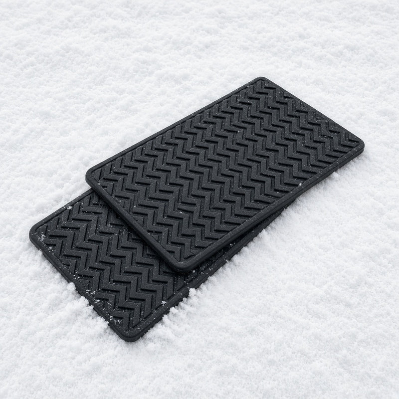 Pair of black traction mats